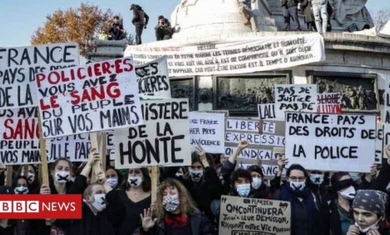 France: Tear gas fired as protesters rally against police security bill