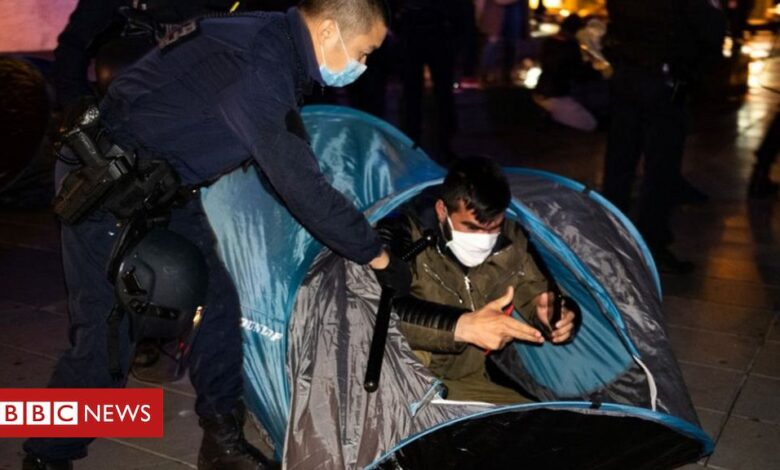 Paris police in 'shocking' clash at migrant camp