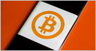 BitPay adds Apple Pay support for its prepaid Mastercard which allows users to instantly convert their cryptocurrencies into fiat to pay for goods and services (Corinne Reichert/CNET)