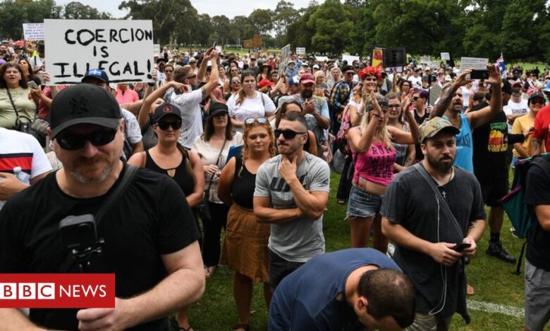 Covid: Anti-vaccination protests held in Australia ahead of rollout