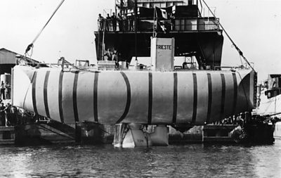 Bathyscapthe Trieste being lowered into the ocean