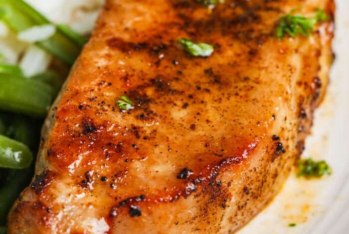 Close up of an air fryer pork chop
