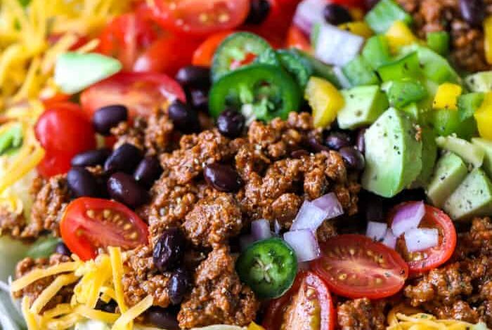 Taco salad in a wooden Bowl