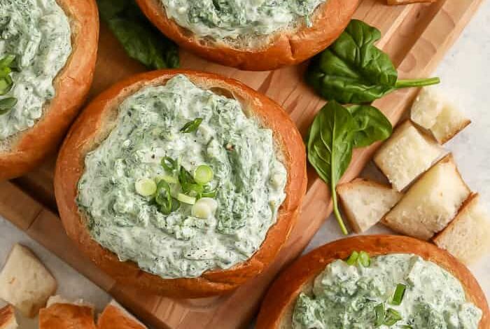 top view of spinach dip a bread bowls