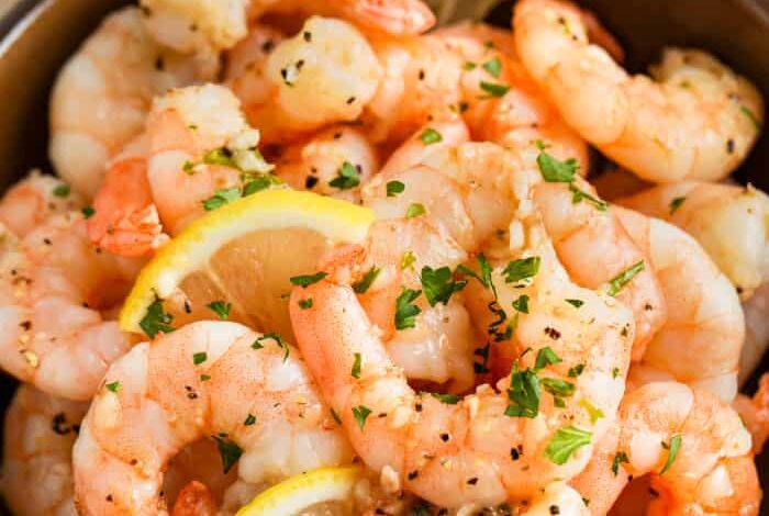 Sauteed Shrimp in a bowl with lemon and parsley