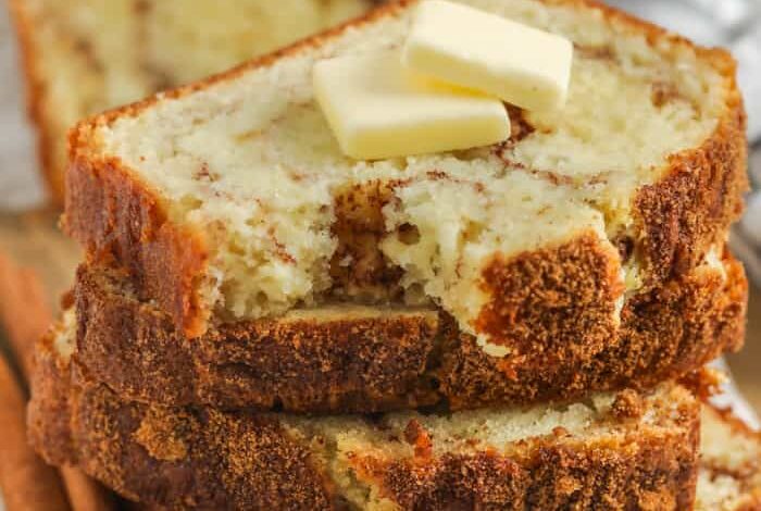 pile of Cinnamon Bread with butter on top