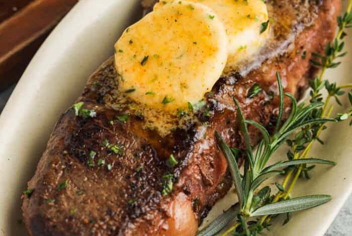 plated steak with melting Steak Butter on top