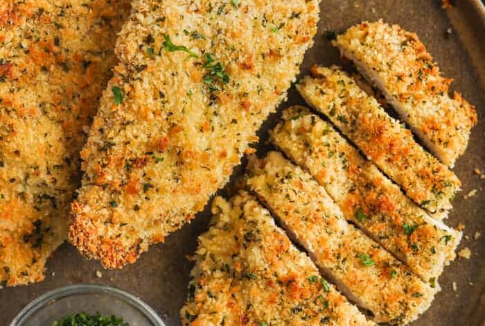 Breaded Baked Chicken on a plate with one sliced