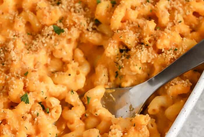 Butternut Squash Mac and Cheese in a dish with a spoon