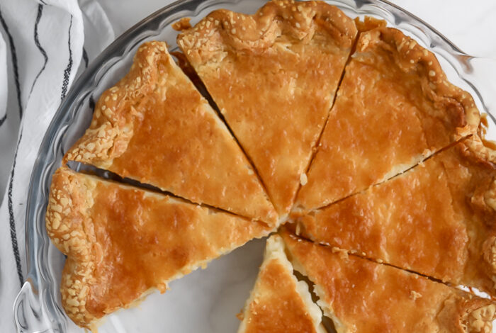 Buttermilk Pie sliced in a pie plate