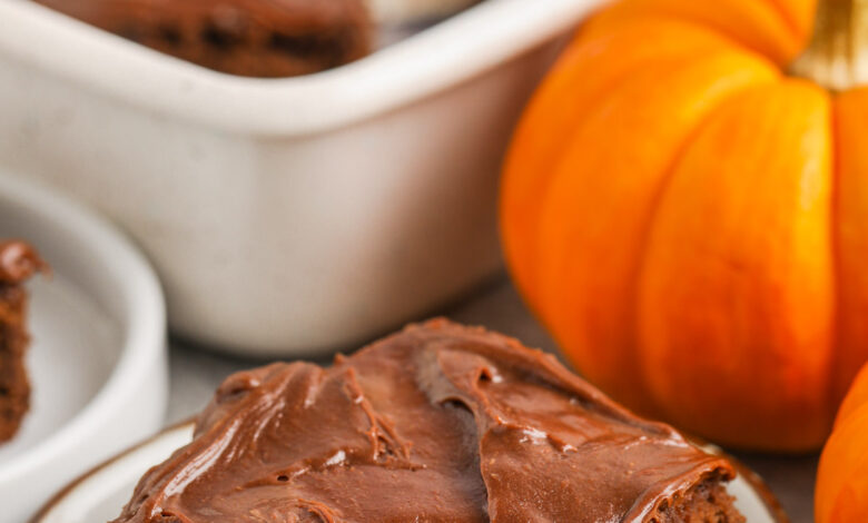 Fudgy Pumpkin Brownies with a bite taken out of one piece