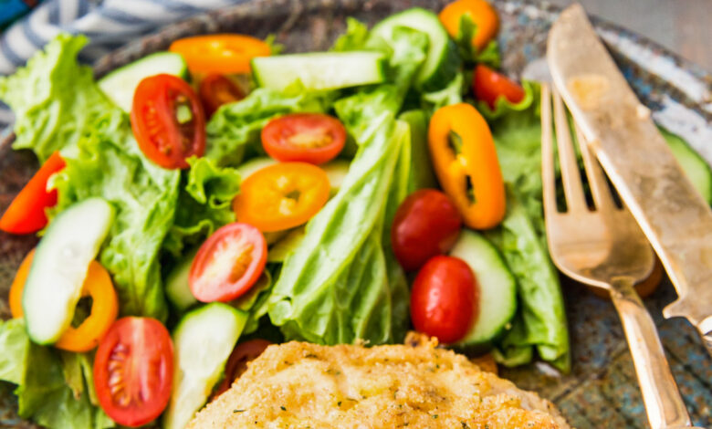 Chicken Kiev on a plate with salad