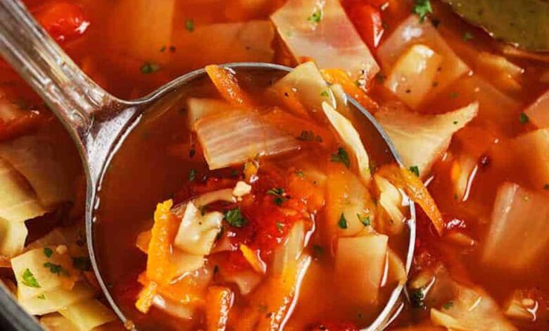 Spoonful of Quick Cabbage Soup from a pot