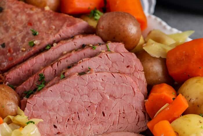 Instant Pot Corned Beef on a plate with veggies