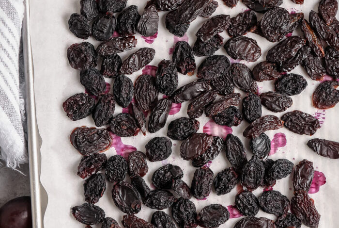 Raisins baked on a parchment lined baking sheet