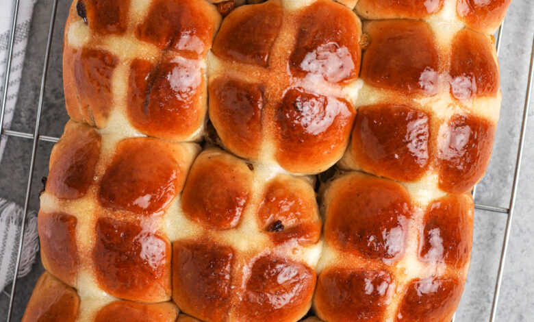 Hot Cross Buns cooling on a baking rack