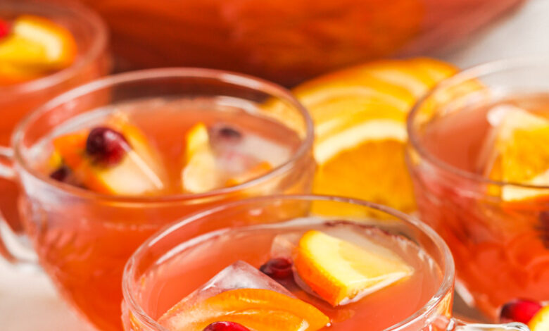 Party Punch served in cups with fruit slices