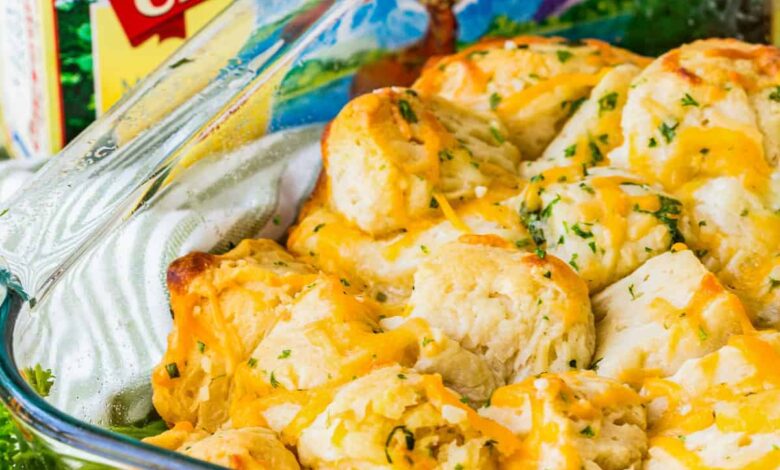 close up of baked Cheesy Garlic Monkey Bread with challenge butter