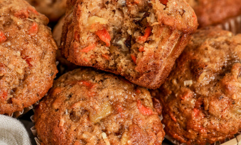 morning glory muffins in a basket lined with a towel