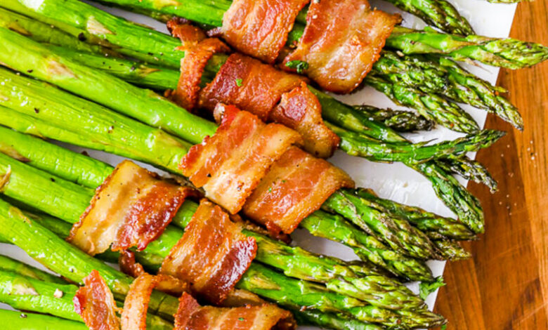 bacon wrapped asparagus on a plate