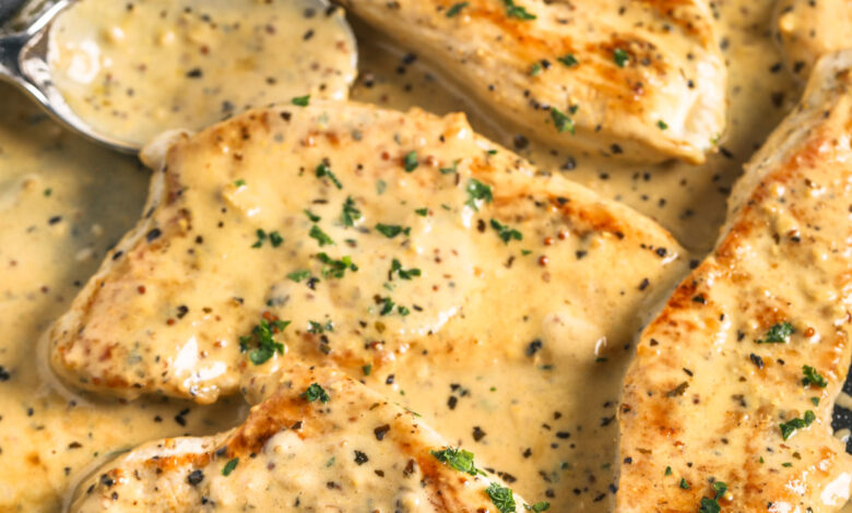 Buttermilk Biscuits in a pile with butter and honey