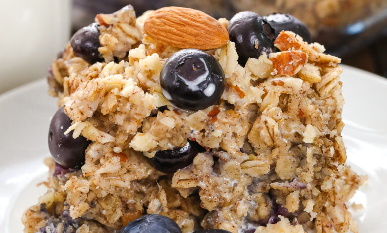blueberry baked oatmeal on a plate with almonds