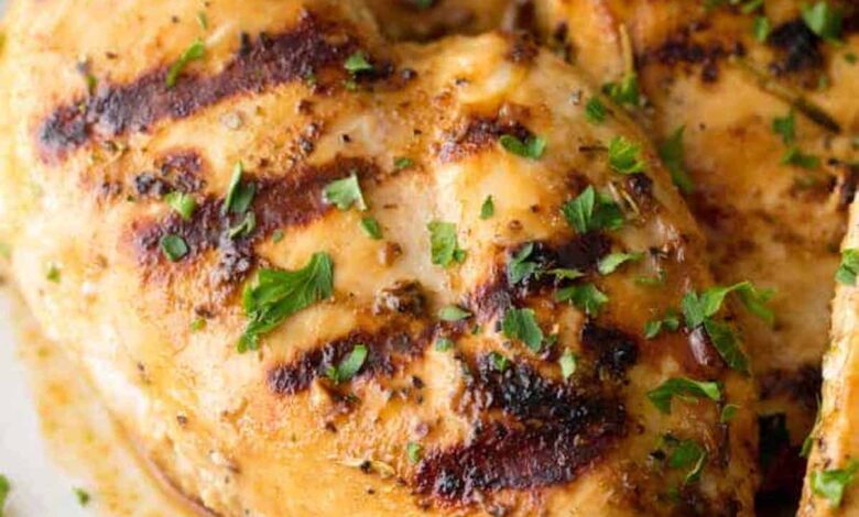 grilled chicken breasts on a plate