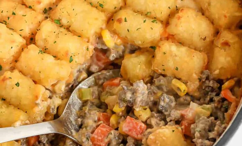 taking a spoonful of Classic Tater Tot-Casserole