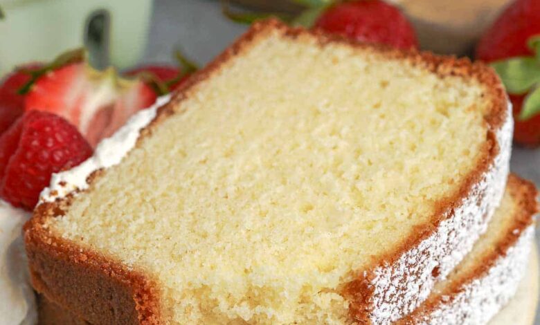 slices of pound cake on a plate next to strawberries