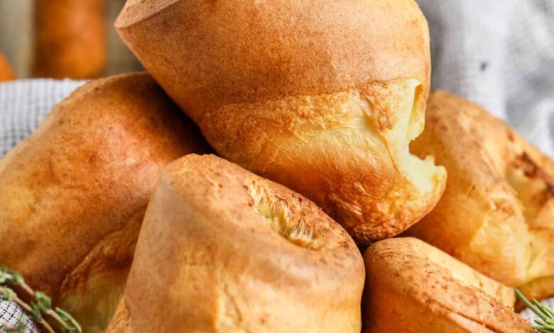 basket of Yorkshire Pudding with beef in the back