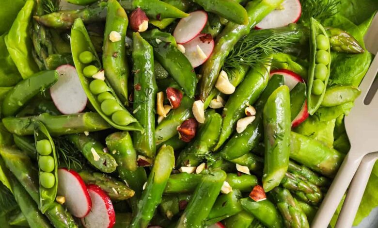 Asparagus salad in a white serving bowl